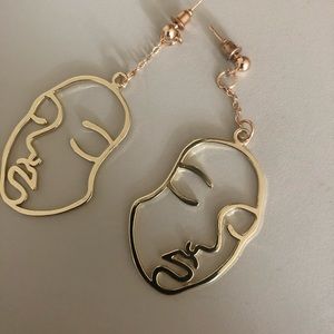 Girl’s Face Earring (free with purchase)
